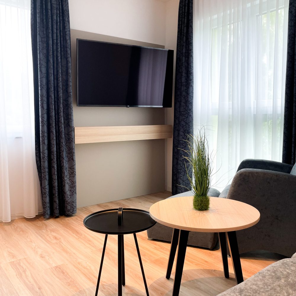 Couchecke im Apartment Familienzimmer im Holi City Apart Hotel Berlin